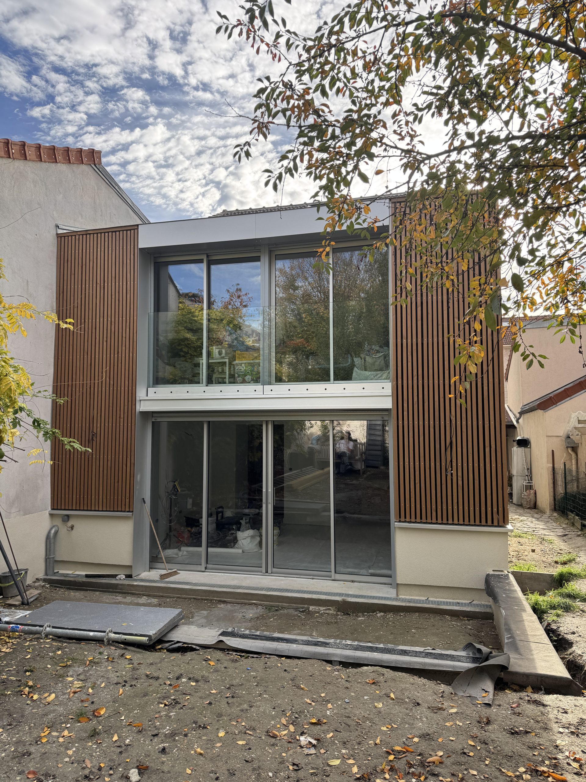 Extension d’une maison en structure bois en clos couvert – Montreuil 93